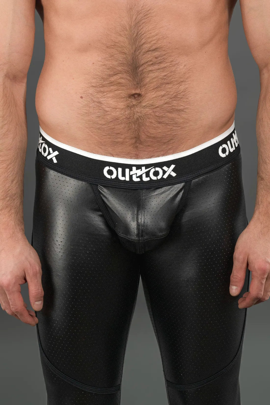 Outtox. Leggings mit Reißverschluss hinten und Snap-Codpiece. Schwarz