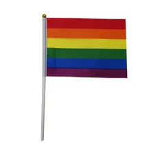Trans Pride Hand Flag from Maskulo Berlin - Show your support with this vibrant flag.