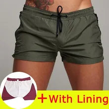 Maskulo NSH326 Green Army Nylon Shorts with zippered pockets, black waist lace, ideal for gym, sports, and casual wear.
