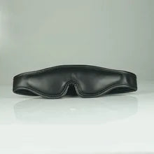 Maskulo NQ1472 Black Padded PU Leather Blindfold with Velcro, blocks light, ideal for cosplay, role-playing, and bedroom games.