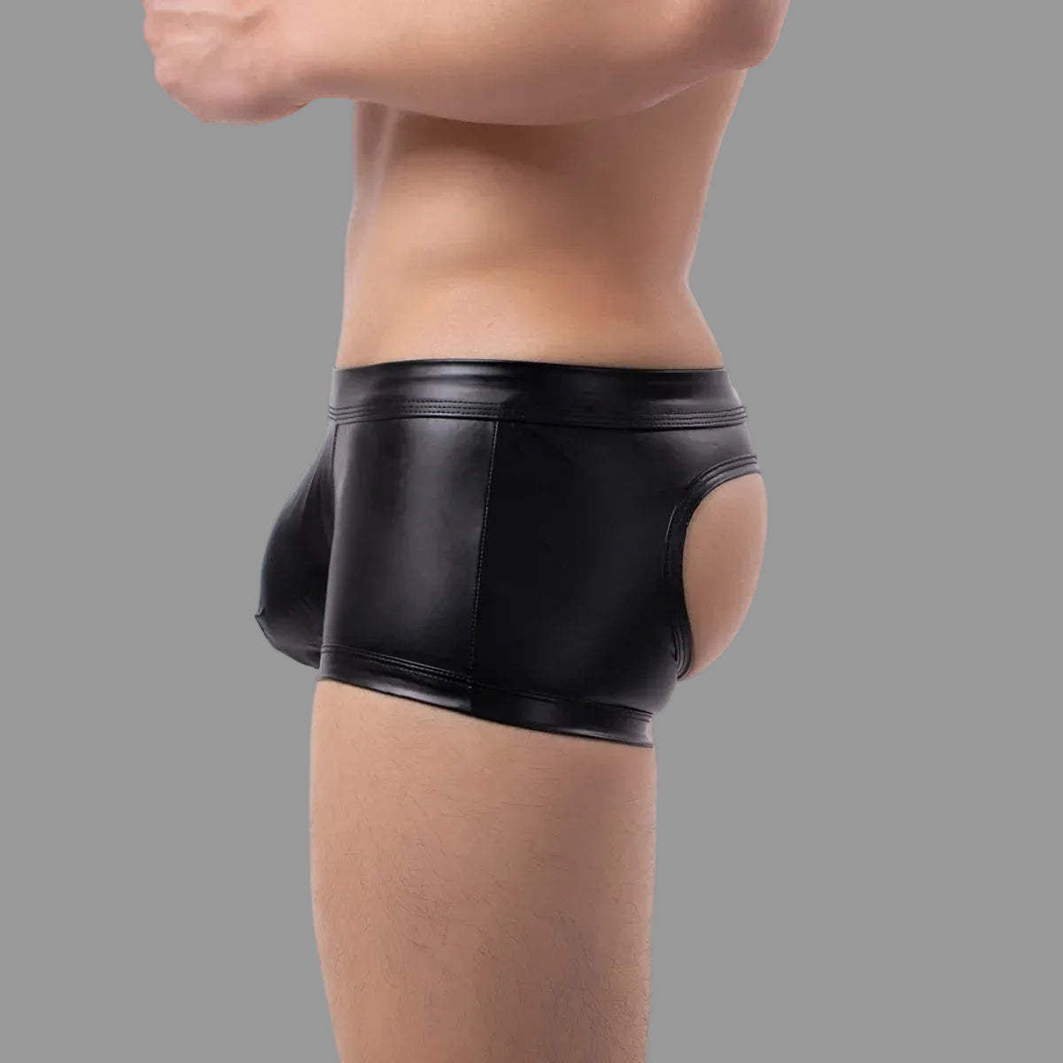 Maskulo NTR319 black PU leather mini shorts with open rear and bulge pouch, ideal for dating.