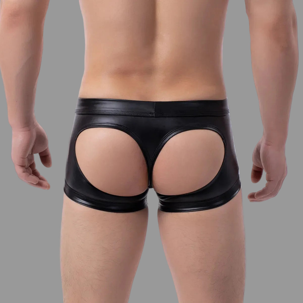 Maskulo NTR319 black PU leather mini shorts with open rear and bulge pouch, ideal for dating.