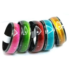 Colorful Cat Eye Ring by Maskulo Berlin. Rainbow and black Stainless Steel Metal Wedding Band. Perfect for daily wear.
