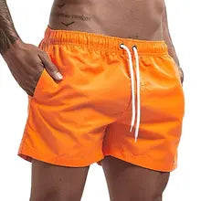 Maskulo NSH328 Orange Free-to-body Nylon Shorts for men with pockets and white waist lace. Soft to touch, inner lining, ideal for gym, sports, and casual wear.