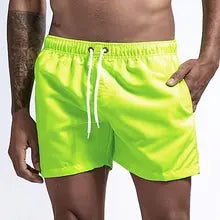 Maskulo NSH327 Free-to-body Nylon Shorts in Green Neon, with 2 pockets and white waist lace. Soft to touch, inner lining, ideal for gym, sports, and daily wear.