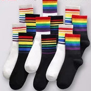 Maskulo NSC337 Rainbow Line Crew Socks, black with 7 equal colored stripes, made from cotton, polyester, and spandex. Half of profits support LGBT rights organizations. Ideal for daily wear.