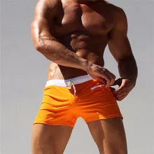 Maskulo NSH364 orange and white trunk shorts with lace and zipper pocket, beach design, stylish club look, made from polyester and spandex, for various activities.