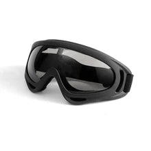 Maskulo NQ1398 Protective Goggles in Hi-Speed Style with black frame and dark smoke glass. Snowboard rider style, adjustable elastic band, made of PVC/Acryl. Ideal for bicycle, motorcycle, daily wear, parties, running, travel, and walking.