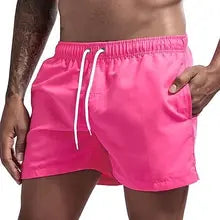 Maskulo NSH329 Free-to-body Nylon Shorts in Pink Neon, with 2 pockets and white waist lace. Soft, inner lining, ideal for gym, sports, and casual wear.