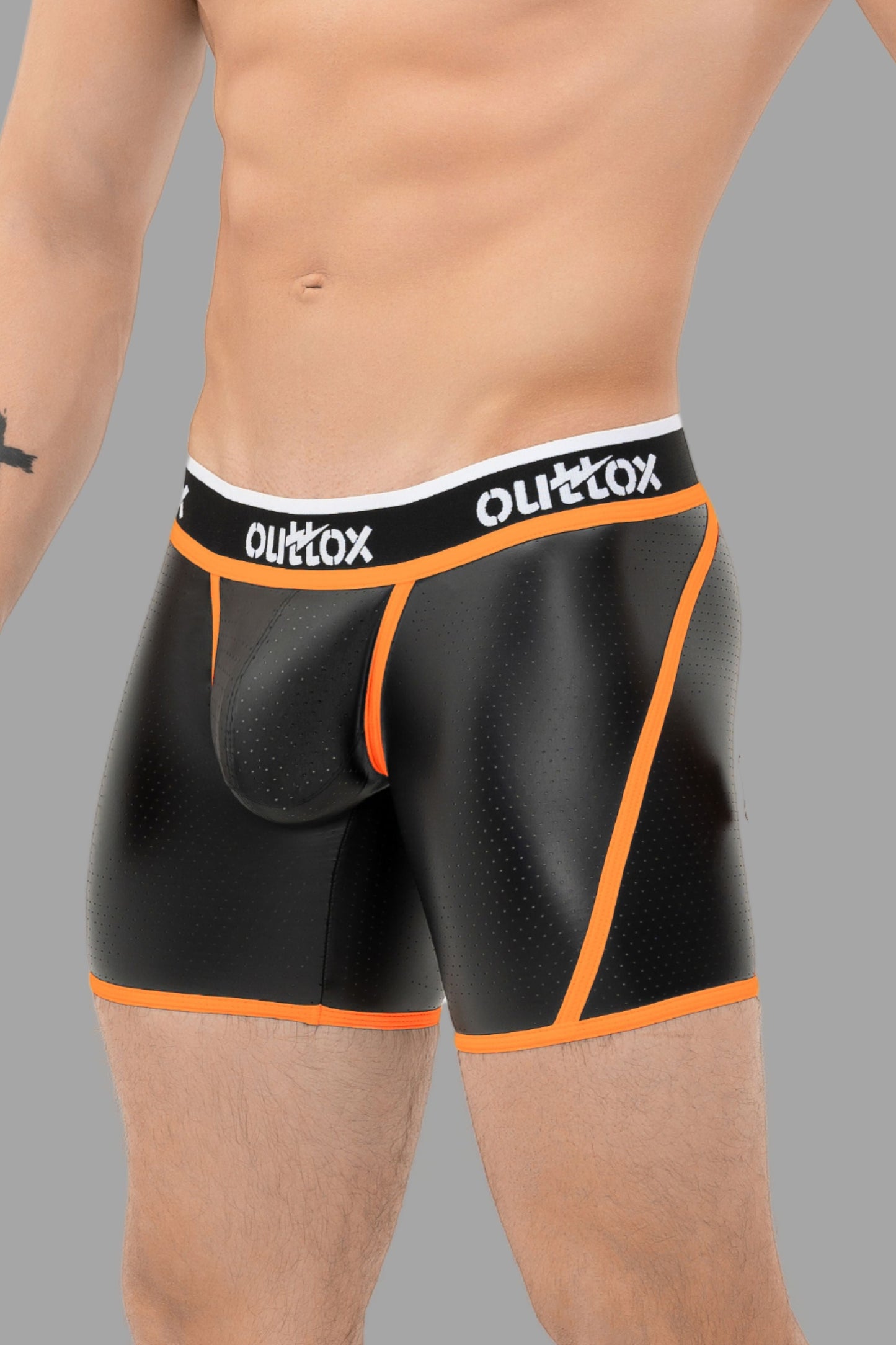 Outtox. Kurze Tights mit umwickelter Rückseite. Snap Codpiece. Schwarz+Orange